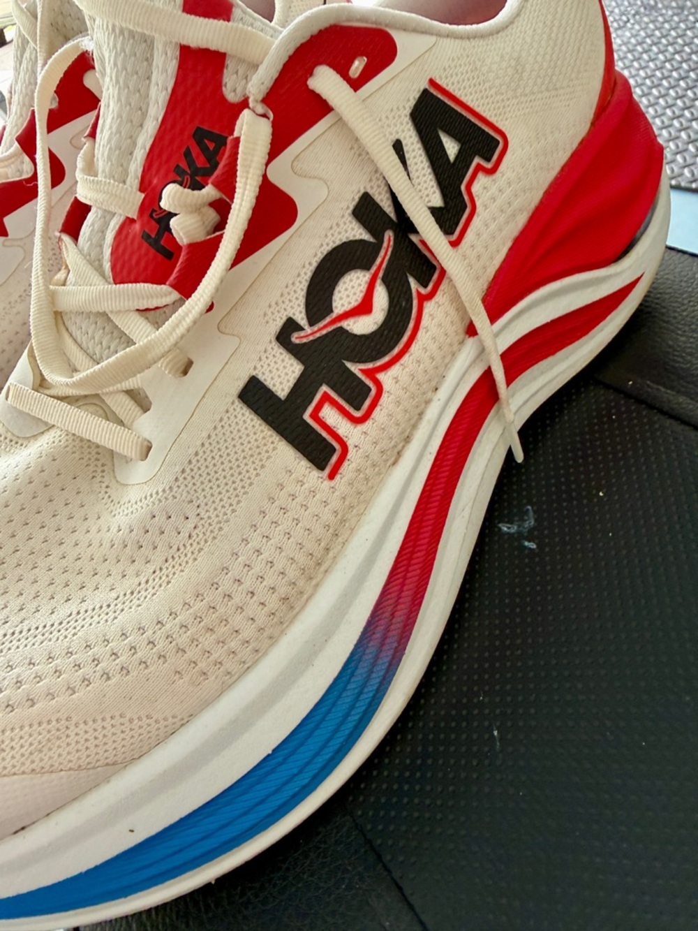 Hoka Men's Cream Running Shoes with Red, Blue and Yellow Accents - Picture 3 of 9